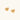 Gold heart-shaped stud earrings with parallel ridged texture on cream background