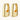 Chunky segmented gold-plated huggie hoop earrings with bamboo-inspired geometric design on white background.