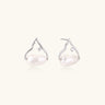 Silver mountain outline studs with baroque pearl and diamond accent on white background