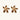 Gold-plated brass flower earrings with brown tortoiseshell enamel petals on cream background