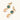 Gold-plated bird stud earrings with iridescent abalone shell medallions and champagne crystal drops on cream background