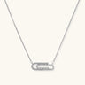 White gold plated necklace with dual-frame geometric pendant featuring crystal pavé border on pale background.