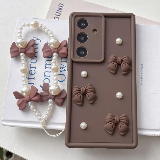 Soft Silicone 3D Bowknot Pearl Phone Case with Beaded Wrist Strap, For Samsung Galaxy A56 5G, For Samsung Galaxy A26 5G, For Samsung Galaxy A36 5G, For Samsung Galaxy A16 4G / 5G, For Samsung Galaxy A15 / 5G, For Samsung Galaxy A55 5G                  ...